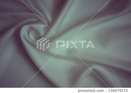 White silk fabric texture with soft shadows and elegant waves 136679535