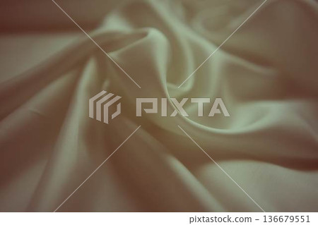 Elegant ivory white silk fabric with soft ripples and subtle greenish tints 136679551
