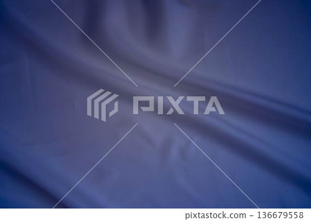 Elegant white silk fabric with deep blue shadows 136679558