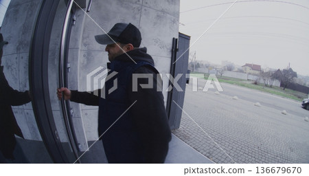 Aggressive Man Behaves Violently on Front Porch, Tries Force Entrance Door Open 136679670