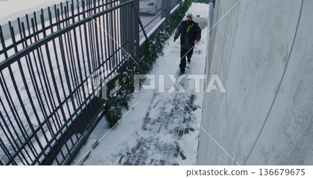 Bearded Man Wearing Casual Clothing Walks Along Cleared Pathway Bearded Man Wearing Casual Clothing Walks Along Cleared Pathway 136679675