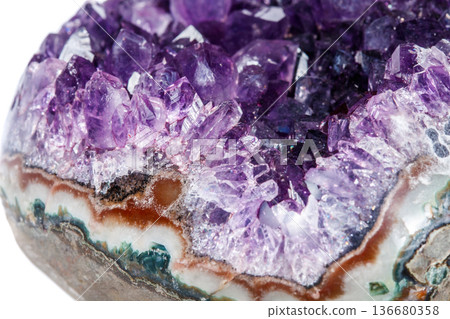 Amethyst Crystal Druse macro mineral on white background Amethyst Crystal Druse macro mineral on white background 136680358
