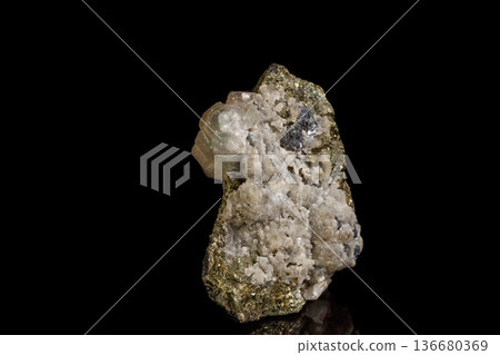 Macro of a mineral stone Sphalerite with fluorite and pyrite on a black background 136680369