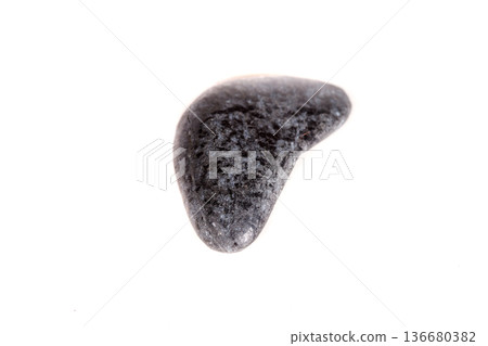 Macro mineral stone lignite on a white background Macro mineral stone lignite on a white background 136680382