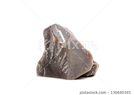 Macro mineral stone Flint in the rock on a white background 136680385