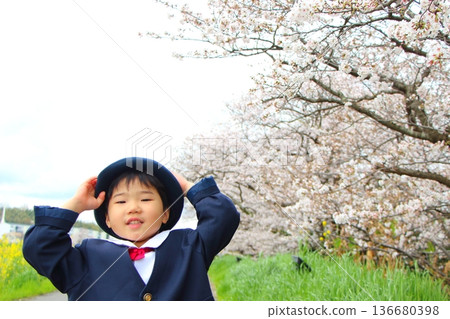 Infant wearing kindergarten uniform, entrance ceremony, graduation ceremony Infant wearing kindergarten uniform, entrance ceremony, graduation ceremony 136680398