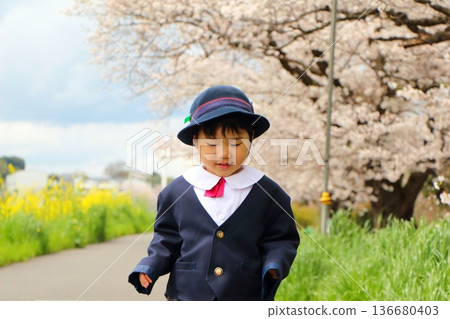 Infant wearing kindergarten uniform, entrance ceremony, graduation ceremony Infant wearing kindergarten uniform, entrance ceremony, graduation ceremony 136680403