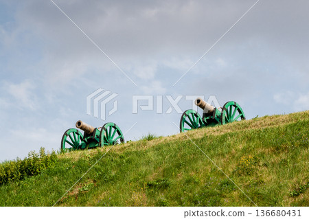 The ancient guns stand on the mountain The ancient guns stand on the mountain 136680431