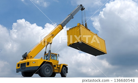 Crane Lifts Container at Industrial Site With Precision in Bright Daytime Sky Crane Lifts Container at Industrial Site With Precision in Bright Daytime Sky 136680548