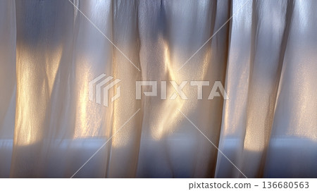 Curtains Move in Soft Morning Wind as Sunlight Streams Through the Window in a Quiet Room Curtains Move in Soft Morning Wind as Sunlight Streams Through the Window in a Quiet Room 136680563