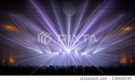 Bright Lights Fill the Dark Room During a Luxury Party Celebration in a Grand Venue Bright Lights Fill the Dark Room During a Luxury Party Celebration in a Grand Venue 136680585