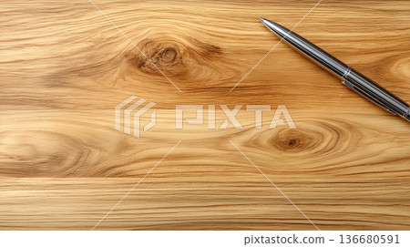 Desk Surface With Empty Space for Writing and a Pen Placed on It During Daytime Hours 136680591