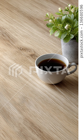 Surface With Coffee Cup and Plant Located on Desk in a Bright and Simple Office Setting Surface With Coffee Cup and Plant Located on Desk in a Bright and Simple Office Setting 136680596