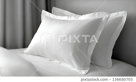 Soft White Pillows Arranged on a Bed in a Luxury Room With Gray Decor During the Day 136680703