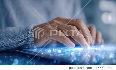 Closeup of Hands Using a Tablet at Home During a Quiet Moment 136680800