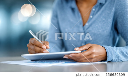 Hands Organize Savings Plan Documents and Use Digital Tablet for Financial Planning 136680809