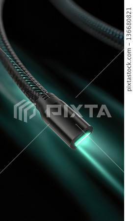 Closeup of Charging Cable With Soft Green Light Glow on a Dark Background During Night Time Closeup of Charging Cable With Soft Green Light Glow on a Dark Background During Night Time 136680821