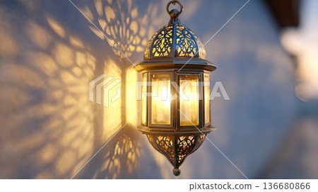 Closeup View of a Traditional Lantern Casting Light Patterns at Sunset in a Quiet Setting Closeup View of a Traditional Lantern Casting Light Patterns at Sunset in a Quiet Setting 136680866
