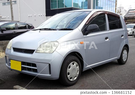 Passenger car parked in a parking lot 136681152