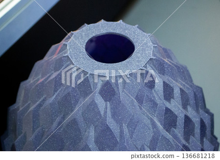 Art form printed on 3D printer from plastic. Art shape made using 3D printing from filament. Additive manufacturing. Layer-by-layer application of material. 3D printing technologies. FDM technology Art form printed on 3D printer from plastic. Art shape made using 3D printing from filament. Additive manufacturing. Layer-by-layer application of material. 3D printing technologies. FDM technology 136681218