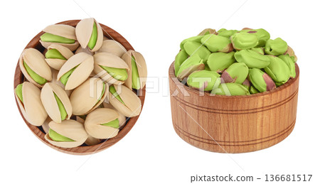 pistachio in wooden bowl isolated on white background with full depth of field. Top view. Flat lay 136681517