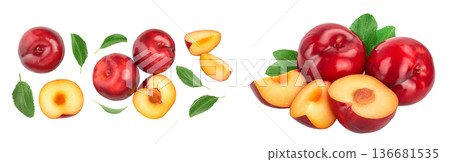 fresh red plum and half with leaves isolated on white background with copy space for your text. Top view. Flat lay fresh red plum and half with leaves isolated on white background with copy space for your text. Top view. Flat lay 136681535