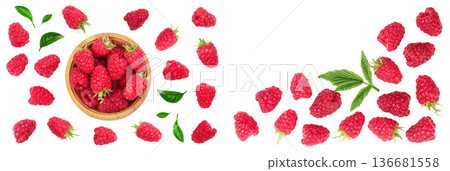 raspberries in wooden bowl with leaves isolated on white background with copy space for your text. Top view. Flat lay pattern 136681558