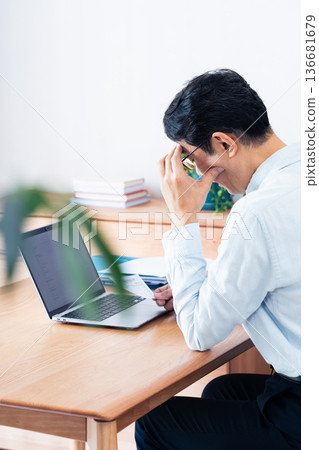 Male man who operates PC 136681679