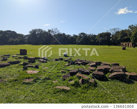 Misiones, San Ignacio, Argentina - June 23, 2025: Ruins of the Jesuit Mission of San Ignacio Mini do Guaranisi. UNESCO World Heritage Site. Panoramic view. Misiones, San Ignacio, Argentina - June 23, 2025: Ruins of the Jesuit Mission of San Ignacio Mini do Guaranisi. UNESCO World Heritage Site. Panoramic view. 136681808