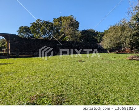 Misiones, San Ignacio, Argentina - June 23, 2025: The walled ruins of the Jesuit mission of San Ignacio Mini do Guaranisi date back to 1632 and are an important historical site of the region. Misiones, San Ignacio, Argentina - June 23, 2025: The walled ruins of the Jesuit mission of San Ignacio Mini do Guaranisi date back to 1632 and are an important historical site of the region. 136681820