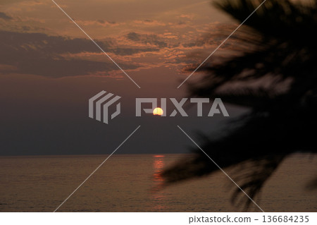 Sunset over the sea Sunset over the sea 136684235
