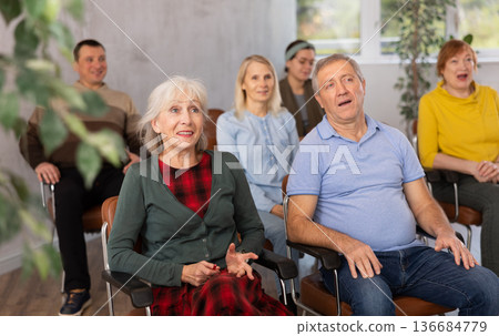 Group of mature students attending lecture in college 136684779