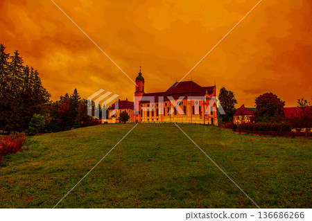 A city stained by the setting sun 136686266