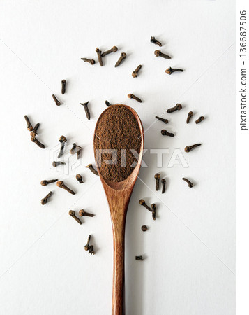 Ground Cloves on Wooden Spoon Flat Lay 136687506
