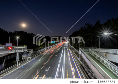 Light trails of cars on the road at night 136687724