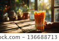 Thai iced tea in clear glass with milk layers 136688713
