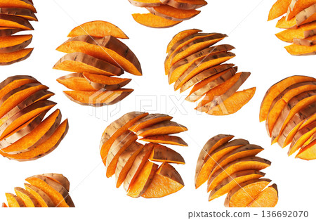 Piles of sweet potato slices placed randomly, isolated on white background, concept of healthy snack food 136692070