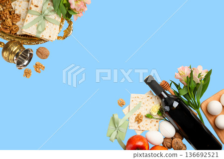 Passover table with matzah, wine, fruits, and flowers displayed 136692521