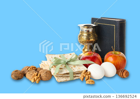 Passover items are displayed on a blue surface 136692524