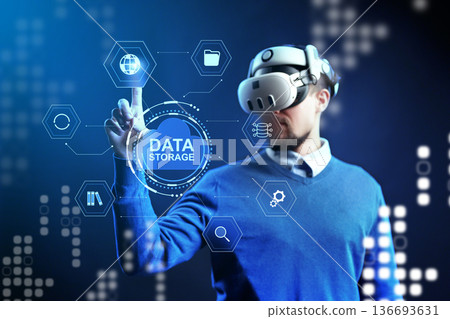 Person uses virtual reality to explore data storage concepts in a tech environment 136693631