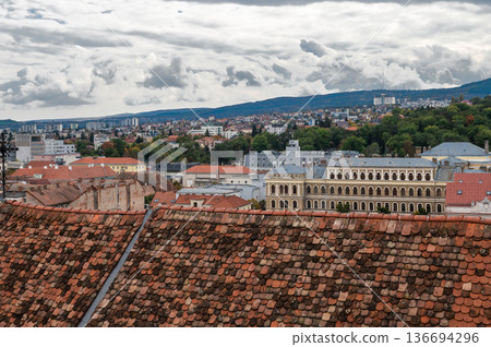 Aerial View of Cluj-Napoca Cityscape with Historic Red Rooftops 136694296