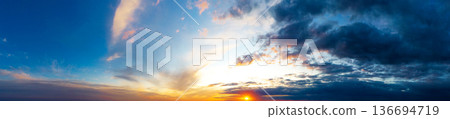 Natural background of the colorful panorama sky. Beautiful cloud in the sunrise sky background. Sky banners background. 136694719