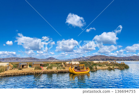 Blue Sky backgTotora boat on the Titicaca lake near Puno, Peruround with tiny Clouds. Panorama background 136694755