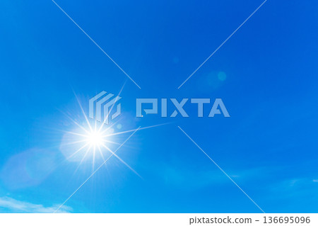 blue sky background with tiny clouds 136695096