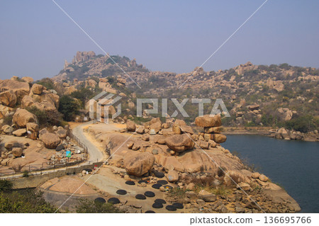 Sanapur Reservoir, artificial lake, granite boulder and  mountains, Karnataka, India. 136695766