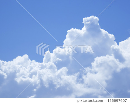 Cumulus clouds rising from below 136697607