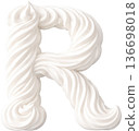 White letter R made of whipped cream with intricate piping 136698018