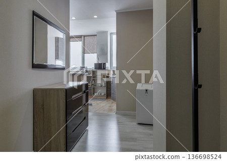 Modern Apartment Hallway Leading to Fully Equipped Kitchen Modern Apartment Hallway Leading to Fully Equipped Kitchen 136698524