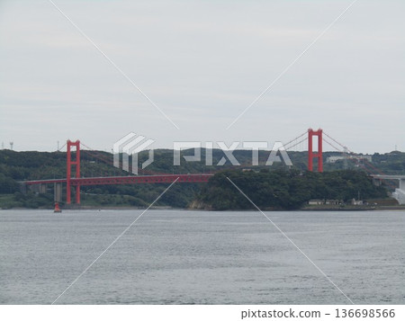 Hirado Bridge, a suspension bridge spanning the Hirado Strait in Hirado City, Nagasaki Prefecture, separating Hirado Island from the Kyushu mainland 136698566