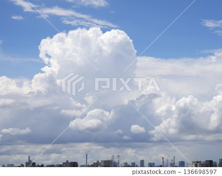 Cumulus clouds rising from below Cumulus clouds rising from below 136698597